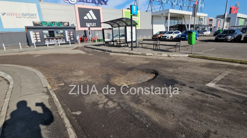 ct bus suspenda intrarea autobuzelor in perimetrul centrului comercial din cauza craterelor din asfalt fotovideo 699c0864a8651