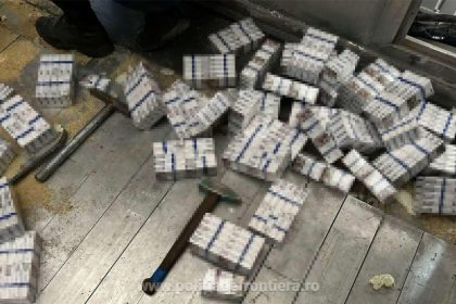 contrabanda ingenioasa la frontiera tigari in valoare de 63 000 de euro ascunse in podeaua unui camion cu furaje de soia vrac 69aaa94409f09